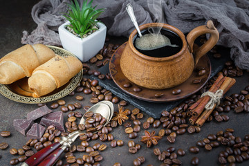 Black coffee on an old background in a cup