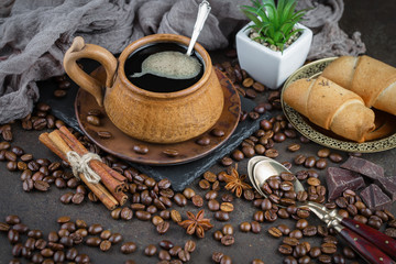 Black coffee on an old background in a cup