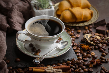Black coffee on an old background in a cup