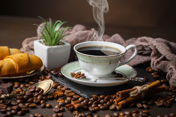 Black coffee on an old background in a cup