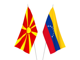 National fabric flags of North Macedonia and Venezuela isolated on white background. 3d rendering illustration.