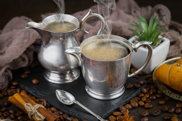 Black coffee on an old background in a cup