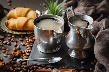 Black coffee on an old background in a cup