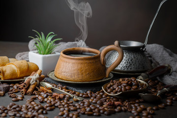 Black coffee on an old background in a cup