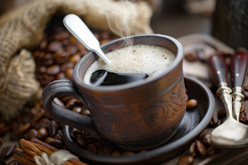 Black coffee on an old background in a cup