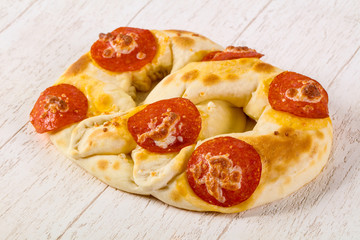 Pretzel with salami