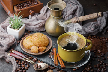 Black coffee on an old background in a cup