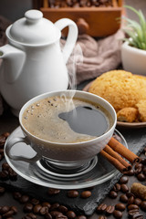 Black coffee on an old background in a cup