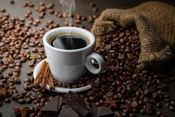 Black coffee on an old background in a cup