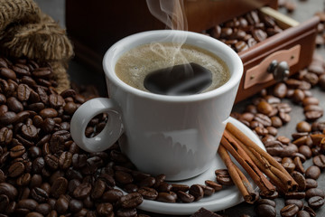 Black coffee on an old background in a cup