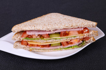 Club sandwich with ham and cheese