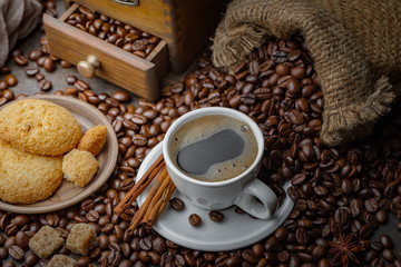 Black coffee on an old background in a cup