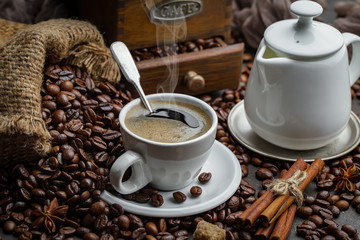Black coffee on an old background in a cup