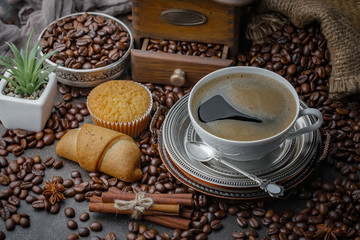 Black coffee on an old background in a cup