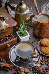 Black coffee on an old background in a cup