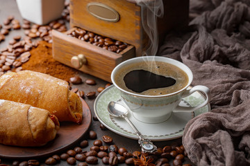 Black coffee on an old background in a cup