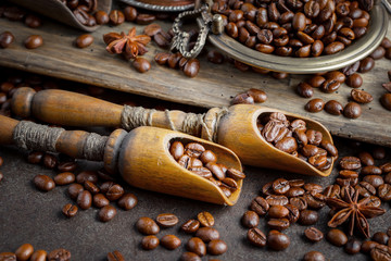 Coffee grains on a table with accessories for coffee