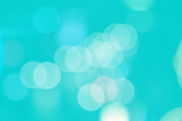 Abstract bokeh lights blue color  background.Abstract blurred bokeh Christmas or New Year lights in background.