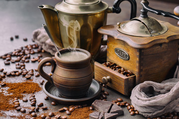 Black coffee on an old background in a cup