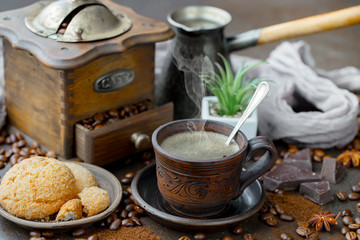 Black coffee on an old background in a cup