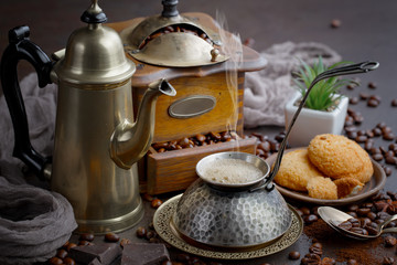 Black coffee on an old background in a cup