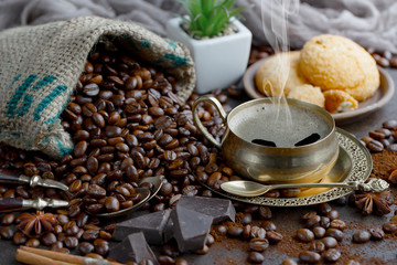 Coffee grains on a table with accessories for coffee