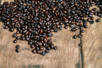 Coffee bean roasted on wooden background