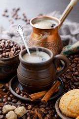 Black coffee on an old background in a cup