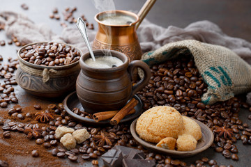 Black coffee on an old background in a cup