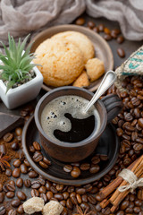 Black coffee on an old background in a cup