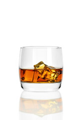 Whiskey with ice isolated on white background.