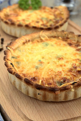 quiche lorraine on a white background
