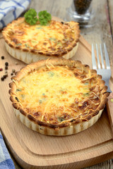 little quiche Lorraine on a cutting board
