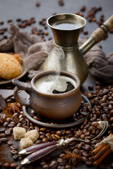 Black coffee on an old background in a cup
