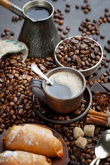 Black coffee on an old background in a cup