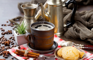 Black coffee on an old background in a cup