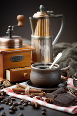 Black coffee on an old background in a cup