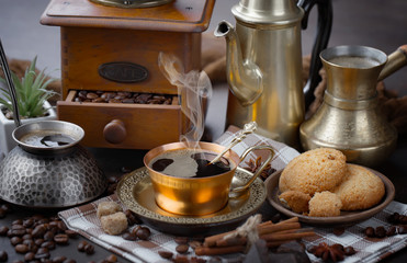 Black coffee on an old background in a cup