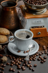 Black coffee on an old background in a cup