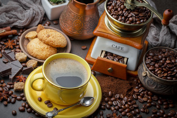 Black coffee on an old background in a cup