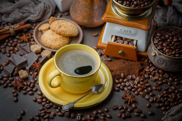 Black coffee on an old background in a cup