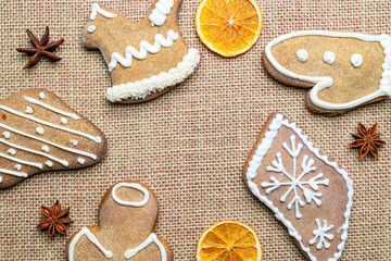 Fototapeta na wymiar Gingerbread cookies, Christmas homemade gingerbread with empty copy space. Celebration cooking Winter concept. New year and Xmas postcard or invitation