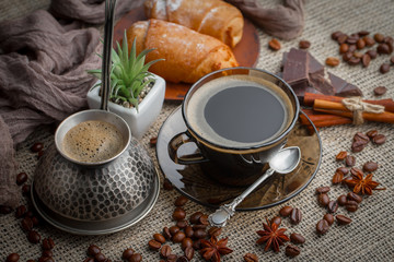 Black coffee on an old background in a cup