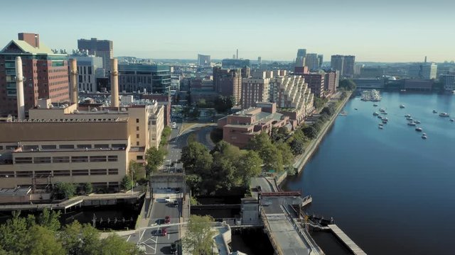 Aerial flying over Charles River with a view to MIT & Cambridge. Boston, Massachusetts, USA. 29 August 2019