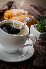 Black coffee on an old background in a cup