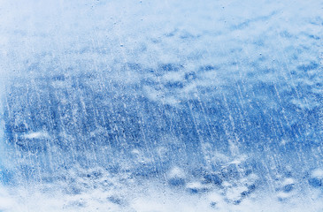 Ice background. The frozen texture of the water