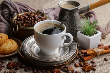 Black coffee on an old background in a cup