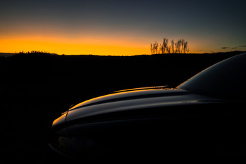 Obraz na płótnie Canvas driving on highway at sunset
