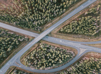 beautiful Aerial view of highway and overpass with green woods in Finland near Helsinki