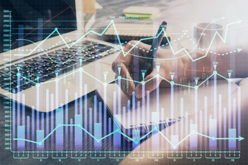 Forex chart displayed on woman's hand taking notes background. Concept of research. Multi exposure